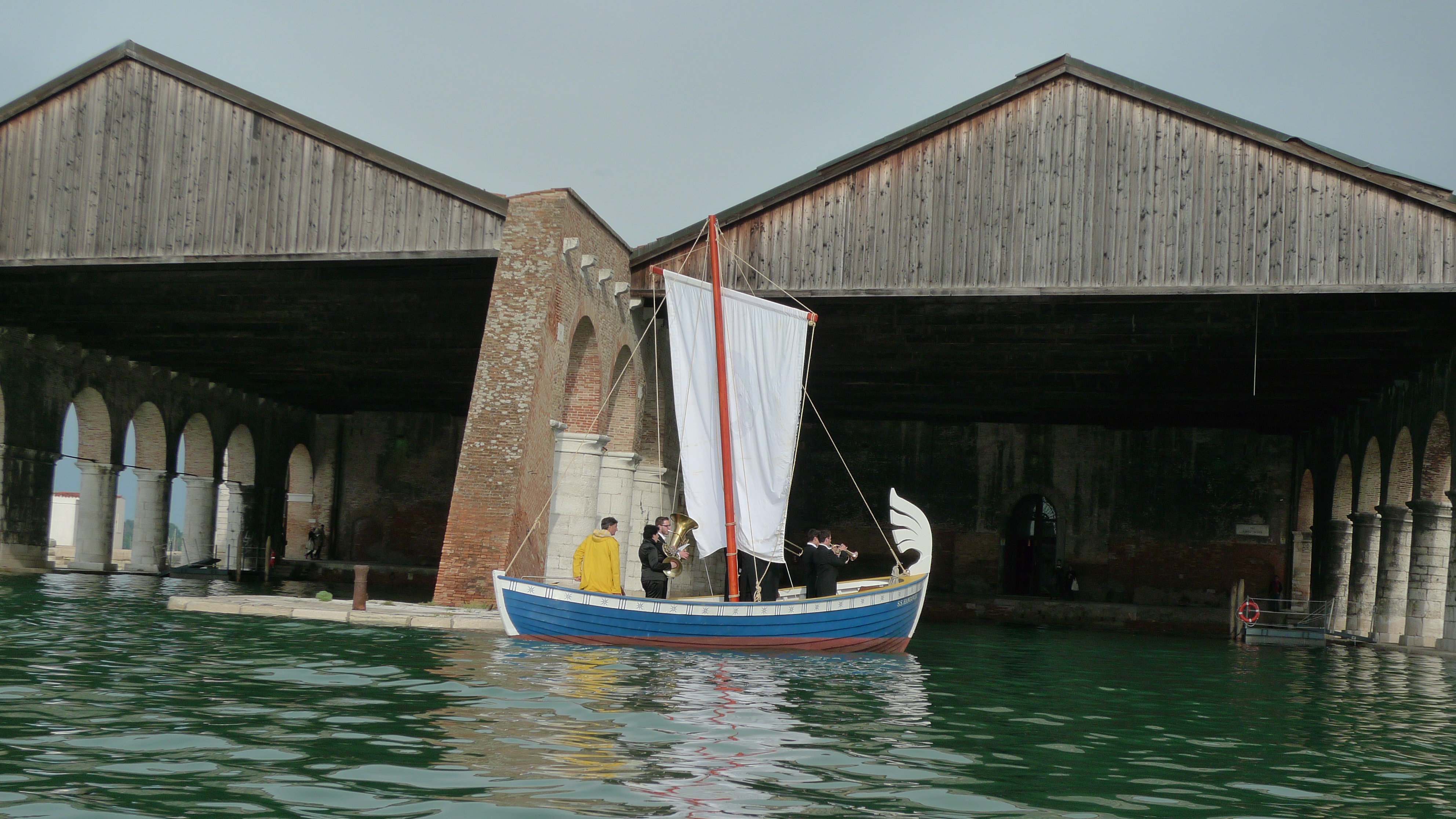 Icelandic artist, Ragnar Kjartansson's 'SS Hangover' rowing up and down the canal with a small orchestra