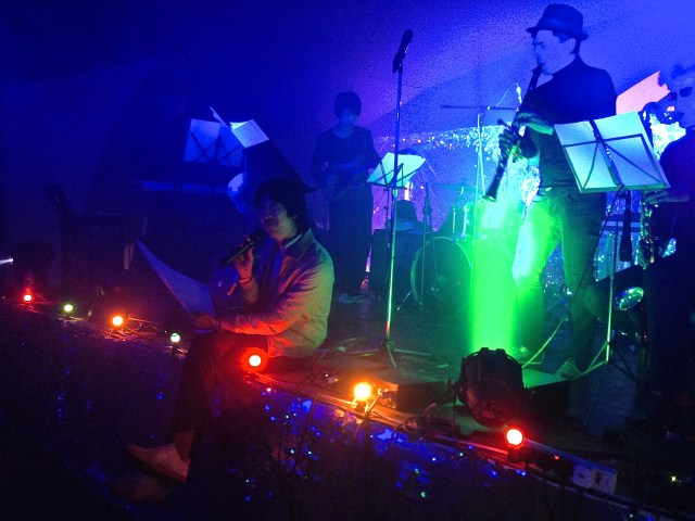 Hong Kong artist Adrian Wong performing 'Rainbow Connection' at the Bearded Lady tent