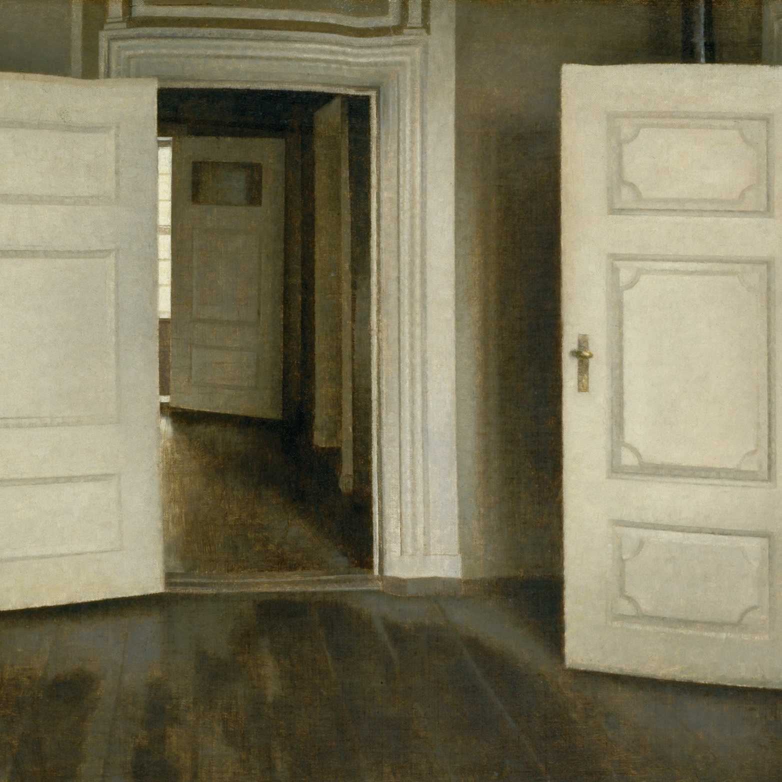 An open doorway leading into a softly lit room with another doorway visible in the background, featuring plain white doors and dark wooden flooring.